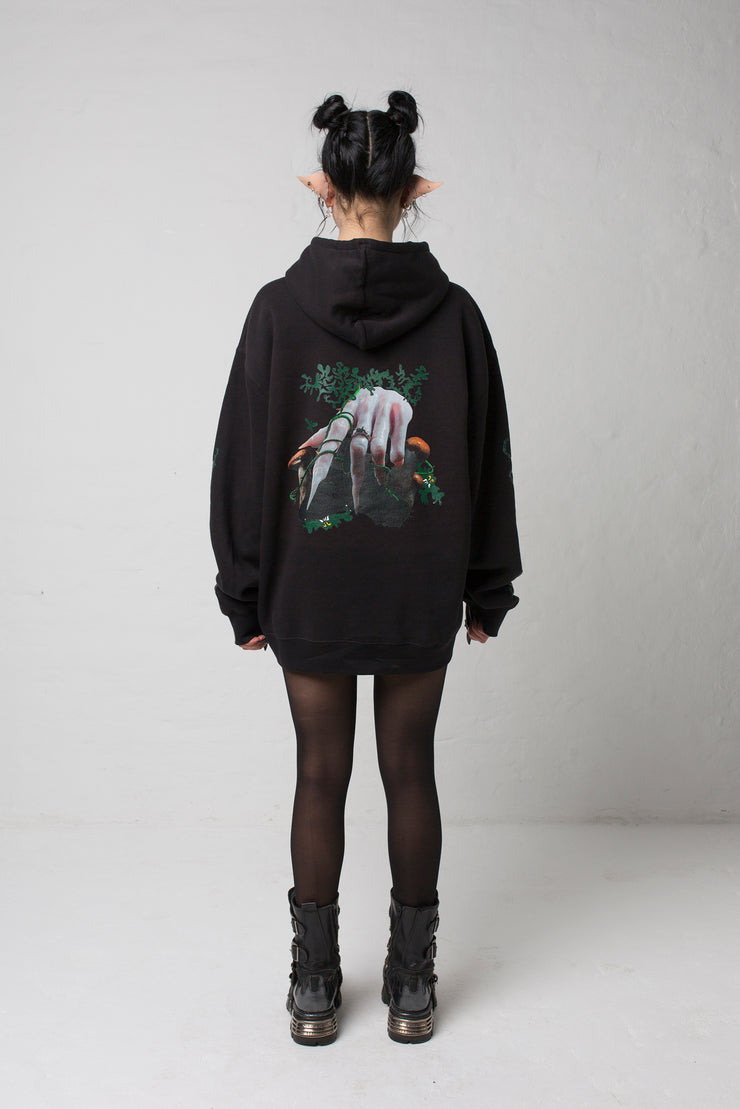 fashion brand BONDY photoshoot showcasing handmade HARLEY black cotton oversized hoodie with digital print on front and back shown on a size small model, part of the new collection DREY:MA. full body back view