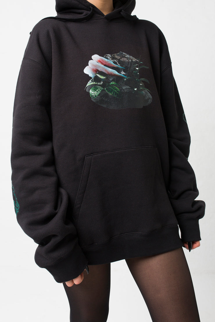 fashion brand BONDY photoshoot showcasing handmade HARLEY black cotton oversized hoodie with digital print on front and back shown on a size small model, part of the new collection DREY:MA. front view