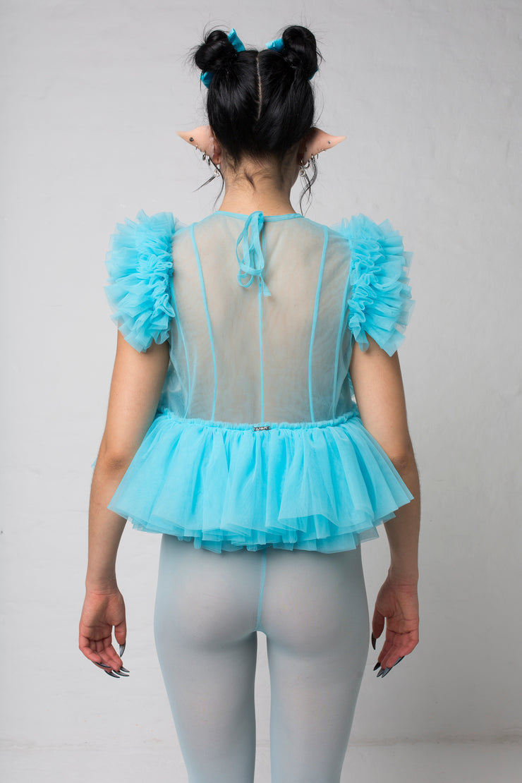 fashion brand BONDY photoshoot showcasing handmade FLEUR ice blue cropped, sheer ruffle 100% tulle top shown on a size small, part of the new collection DREY:MA. back view