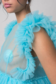 fashion brand BONDY photoshoot showcasing handmade FLEUR ice blue cropped, sheer ruffle 100% tulle top shown on a size small, part of the new collection DREY:MA. detail side view