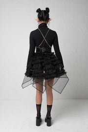 fashion brand BONDY showcasing handmade NERA high waisted double layered black tulle mini skirt with ruffle detail shown on size small model, part of the new collection DREY:MA. full body back view