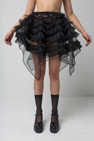 fashion brand BONDY showcasing handmade NERA high waisted double layered black tulle mini skirt with ruffle detail shown on size small model, part of the new collection DREY:MA. front view