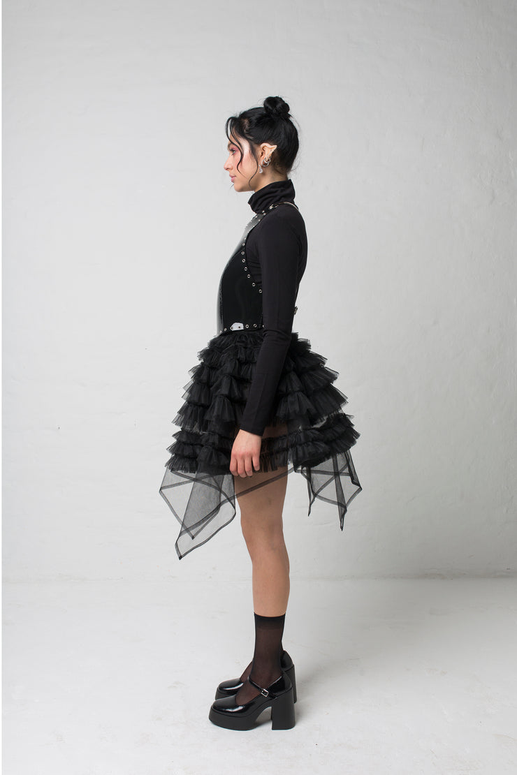 fashion brand BONDY showcasing handmade NERA high waisted double layered black tulle mini skirt with ruffle detail shown on size small model, part of the new collection DREY:MA. full body side view