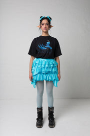 fashion brand BONDY photoshoot showcasing handmade CASSIA mini ruffle ice blue skirt shown on size small model, part of new collection DREY:MA. full body front view