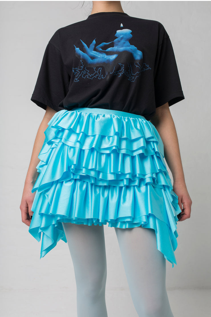 fashion brand BONDY photoshoot showcasing handmade CASSIA mini ruffle ice blue skirt shown on size small model, part of new collection DREY:MA. front view