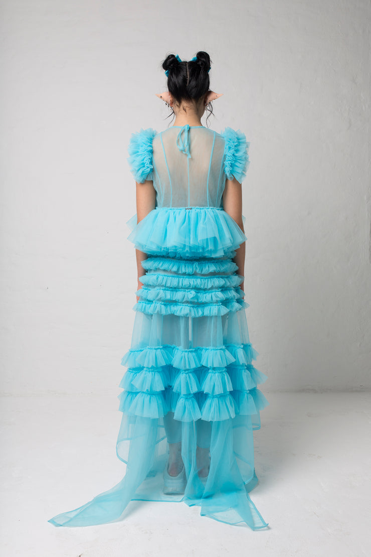 fashion brand BONDY photoshoot showcasing handmade DELPHINE ice blue maxi high waisted, ruffle 100% tulle skirt shown on a size small, part of the new collection DREY:MA. full body back view