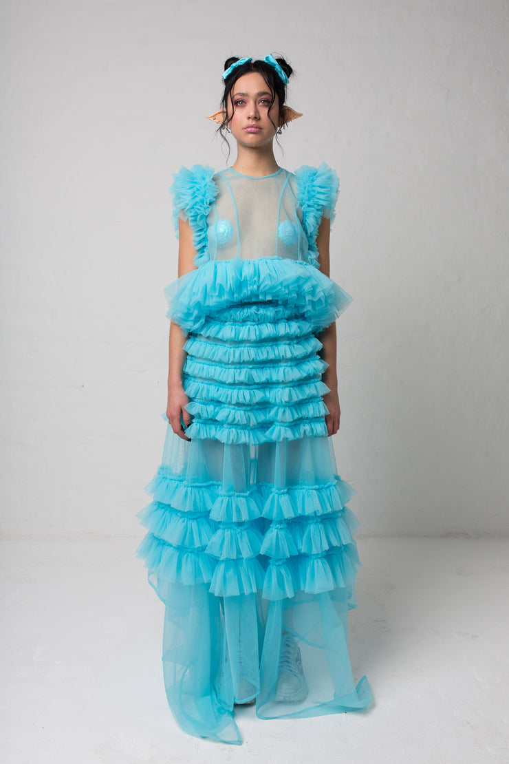 fashion brand BONDY photoshoot showcasing handmade DELPHINE ice blue maxi high waisted, ruffle 100% tulle skirt shown on a size small, part of the new collection DREY:MA. full body front view