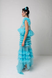 fashion brand BONDY photoshoot showcasing handmade DELPHINE ice blue maxi high waisted, ruffle 100% tulle skirt shown on a size small, part of the new collection DREY:MA. full body side view
