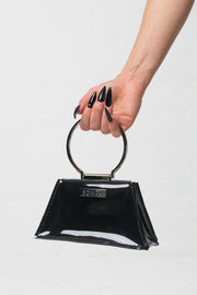 fashion brand BONDY showcasing handmade ZELDA black 100% PVC bag with big ring as handle, part of the new collection DREY:MA. back view