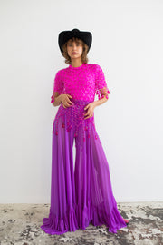 Violet wide leg pants with elastic material, scalloped hemline with extra ruffles