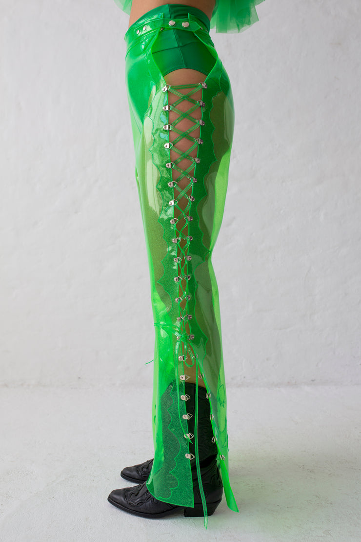 Green glitter PVC pants flared cut, laceable on the side with crocodile embroidery at the hem