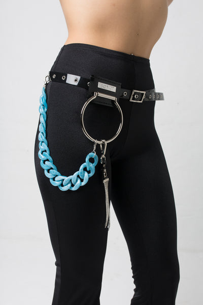fashion brand BONDY showcasing handmade MORGAN PVC black belt accessory with blue acrylic chain detail shown on size small model, part of the new collection DREY:MA. front view