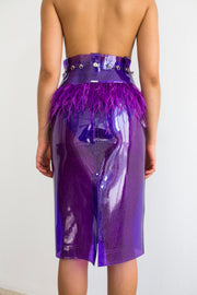 Purple glitter pencil skirt in PVC with ostrich feathers at hem with decorative belt loop